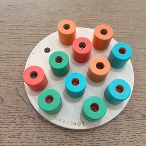 Lovevery wooden stacking peg board with pegs